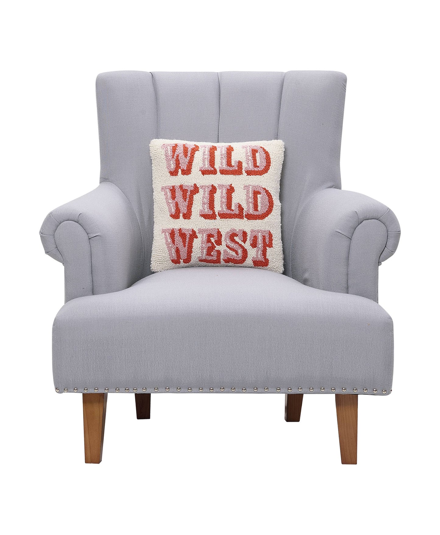 Gray armchair with a pillow that says 'Wild Wild West' on a white background