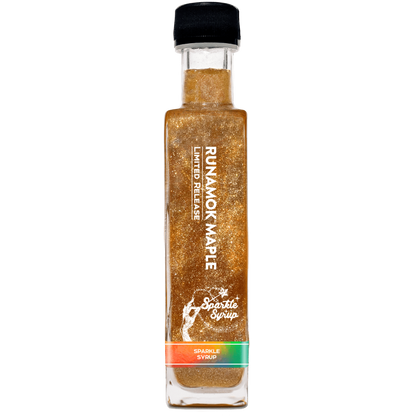 Bottle of Runamok Maple sparkle syrup on a white background