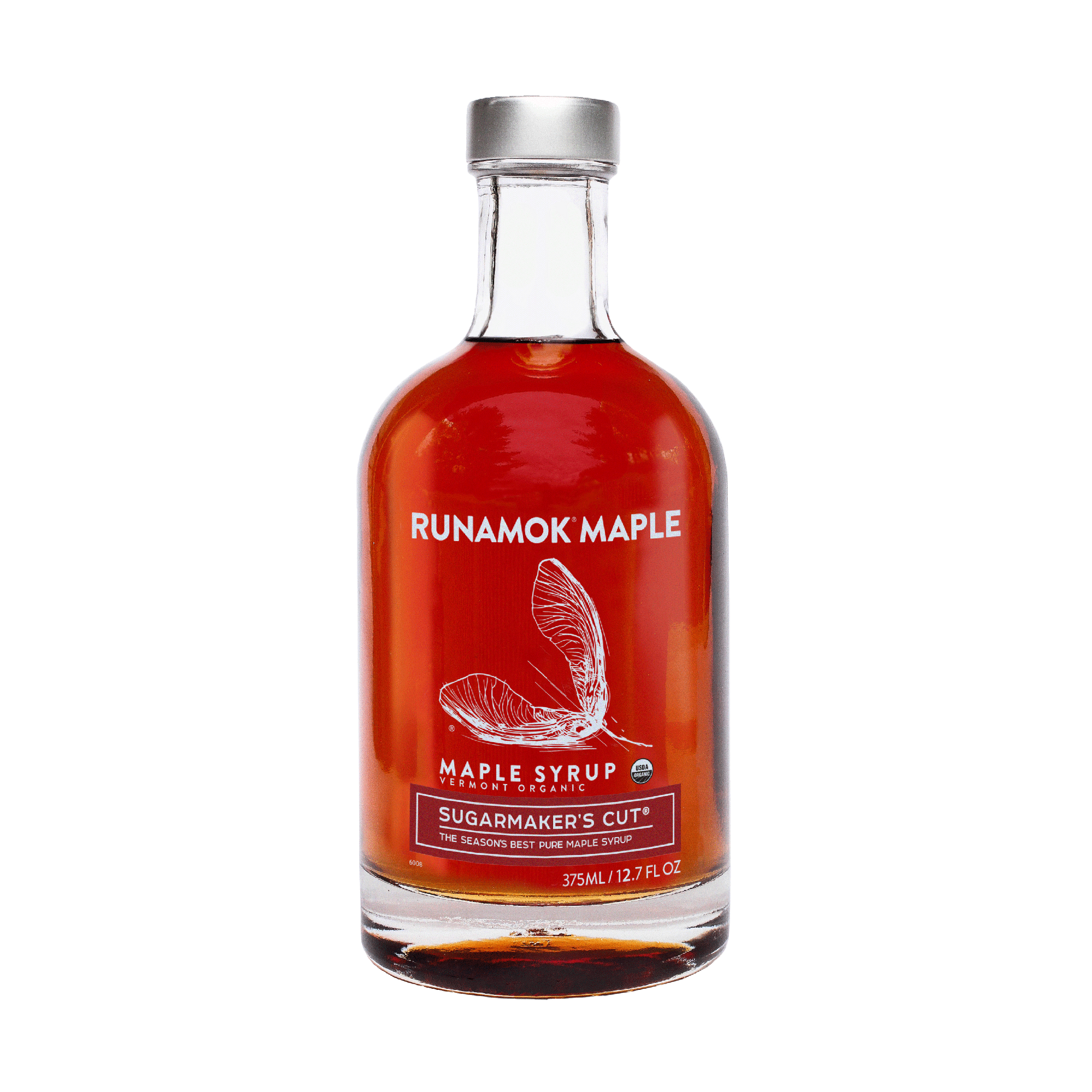 Bottle of Runamok Maple syrup with a red label on a white background