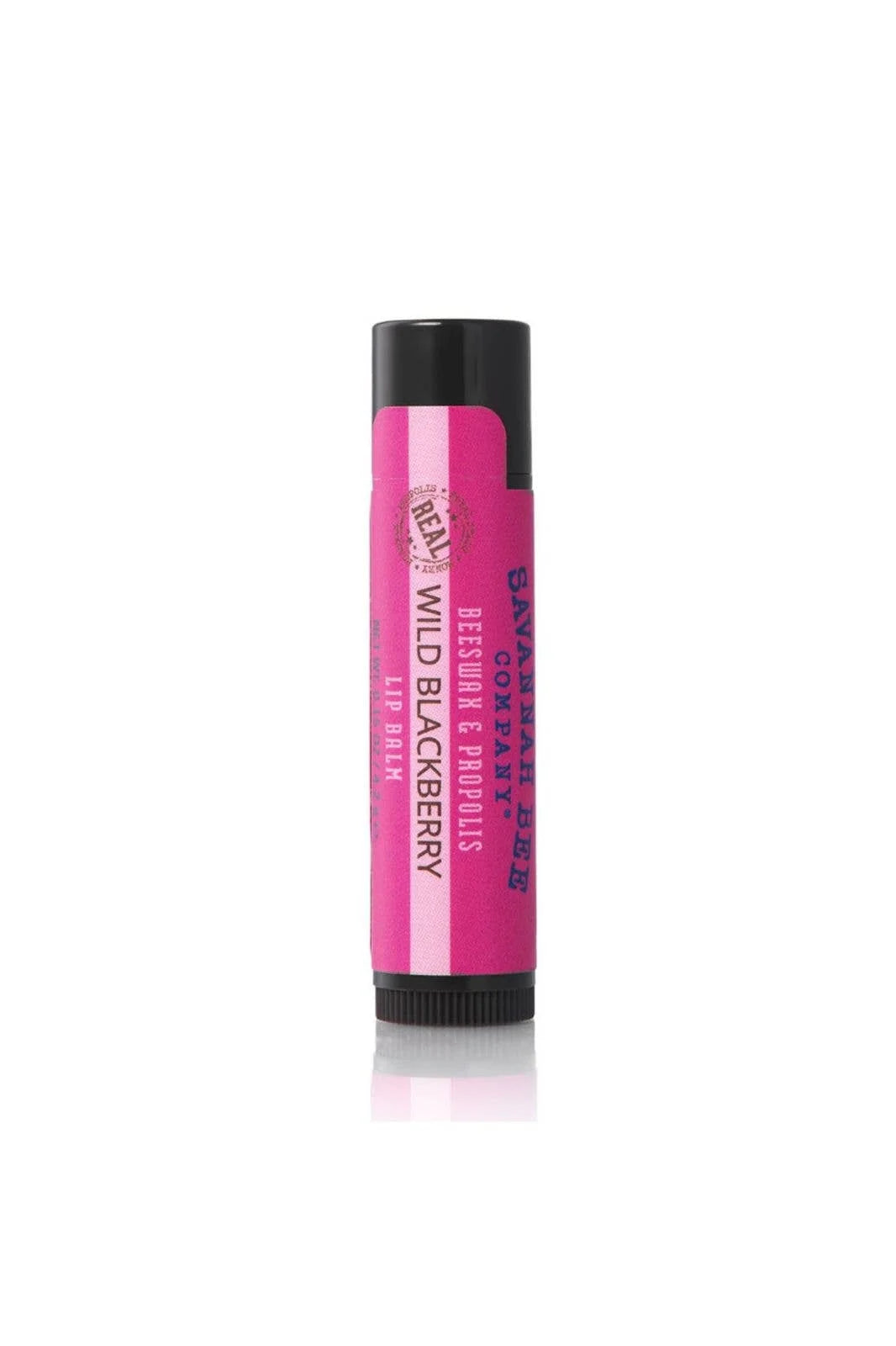 Pink lip balm with black cap on a white background