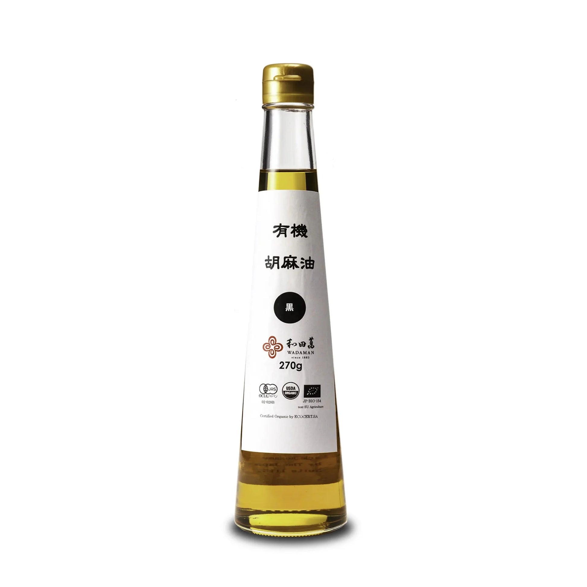 Bottle of sesame oil with a white label on a white background