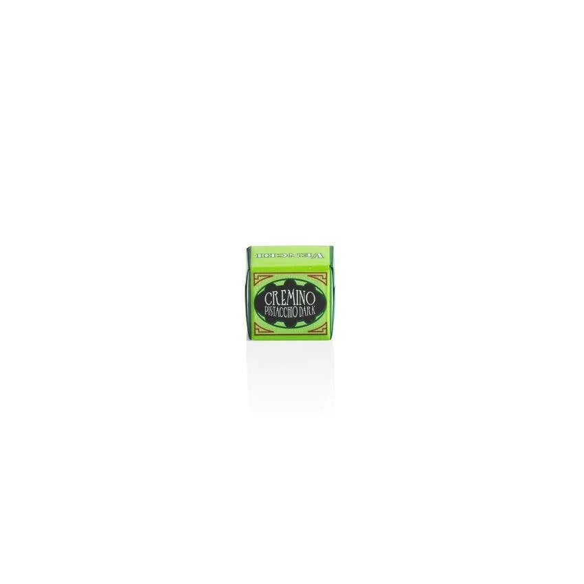 Bar of soap with a green label on a white background
