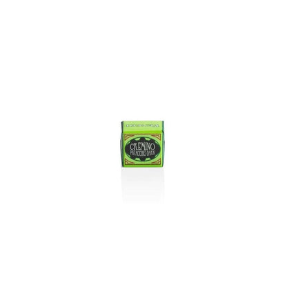 Bar of soap with a green label on a white background