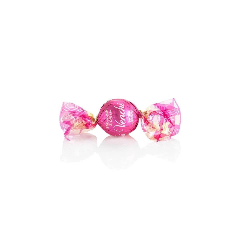 Two pink wrapped candies on a white background
