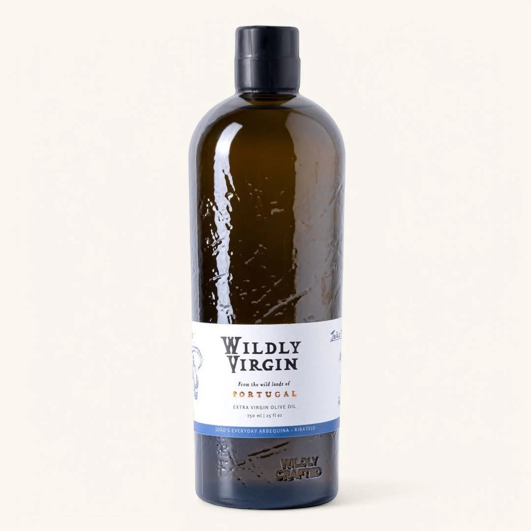 Bottle of Wildly Virgin olive oil on a white background