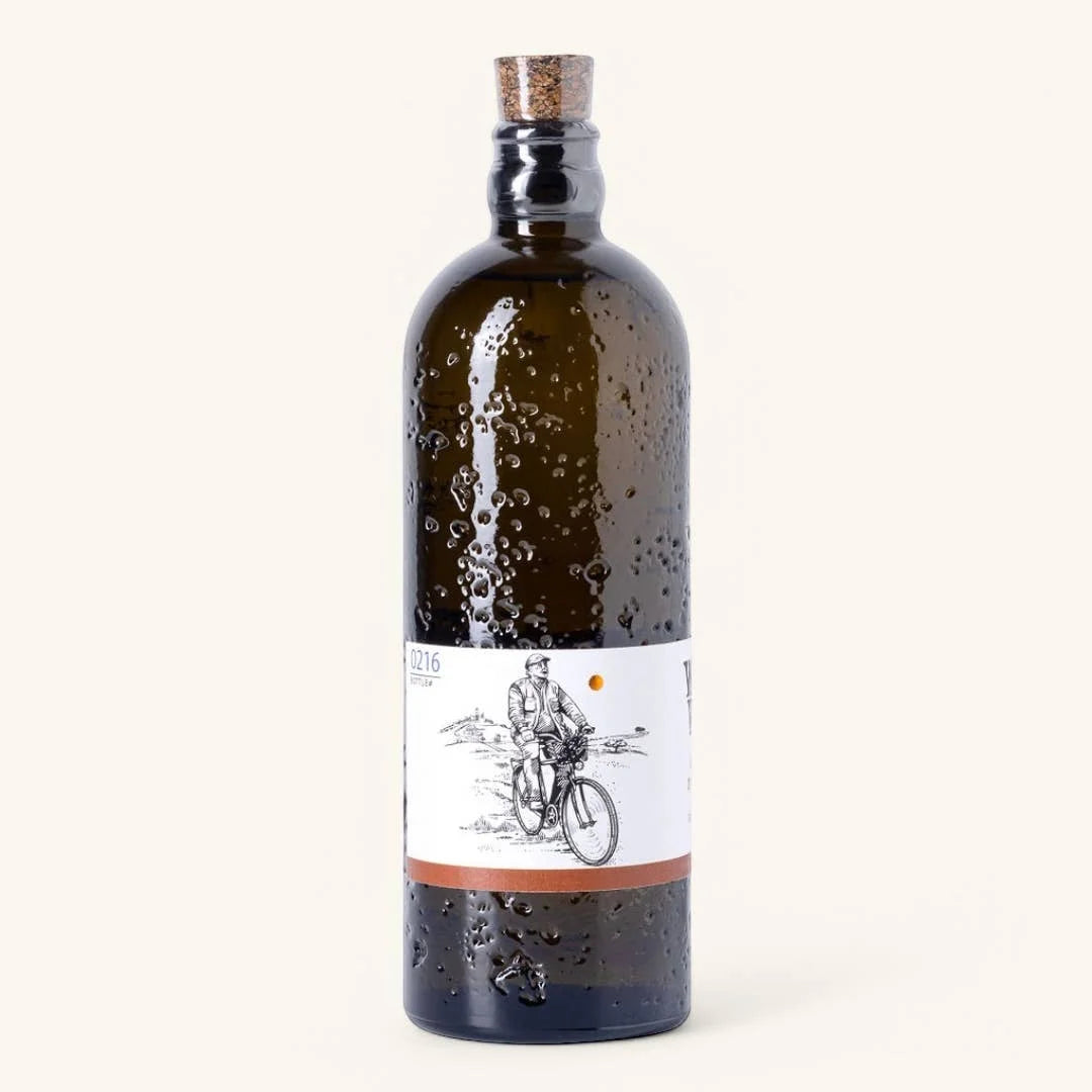 Bottle with a cork lid on a white background