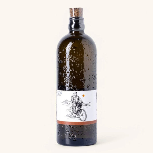 Bottle with a cork lid on a white background