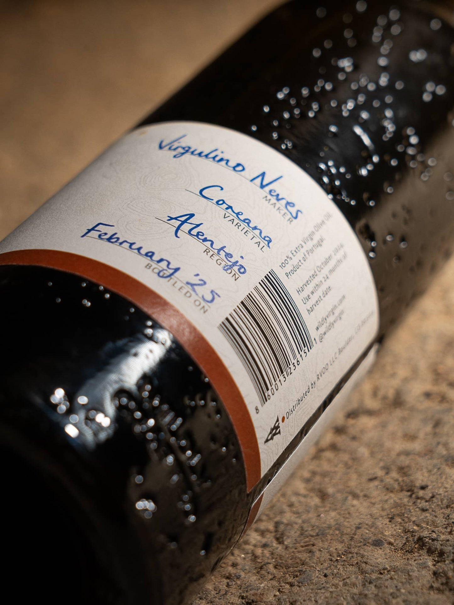 Wine bottle label with text and a barcode on a textured surface
