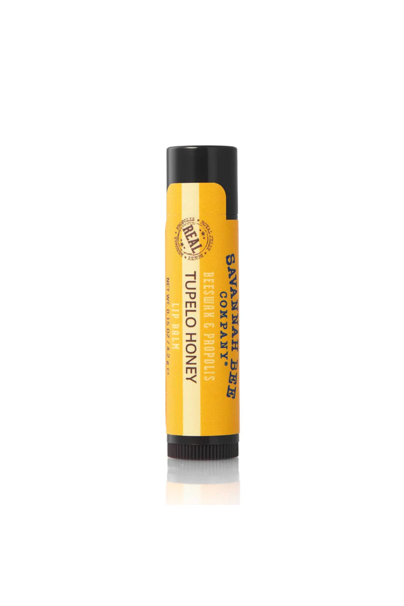 Lip balm tube with yellow label on a white background