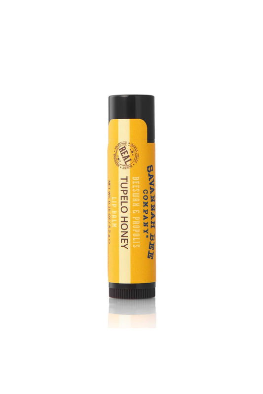 Lip balm tube with yellow label on a white background